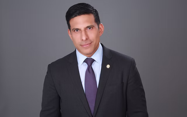 Dr. Sam Chandan