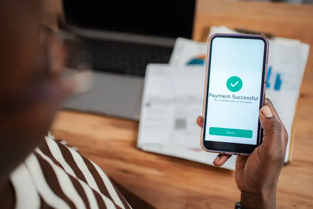 tenant viewing payment successful confirmation on a payment app after completing rent transaction