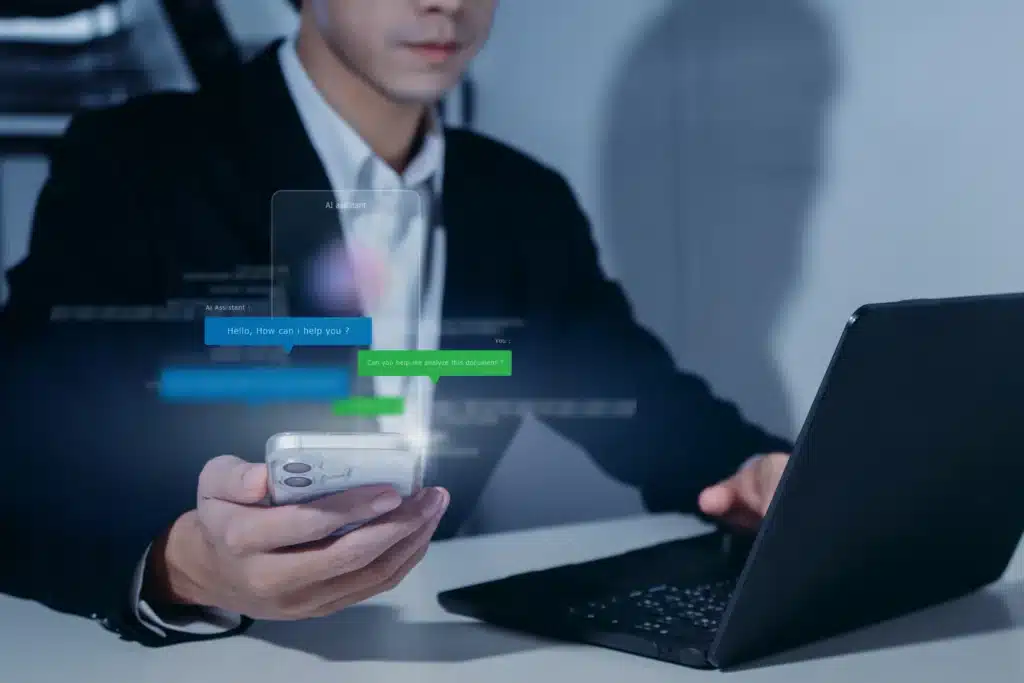 businessman interacting with real estate property management software via AI chat on smartphone